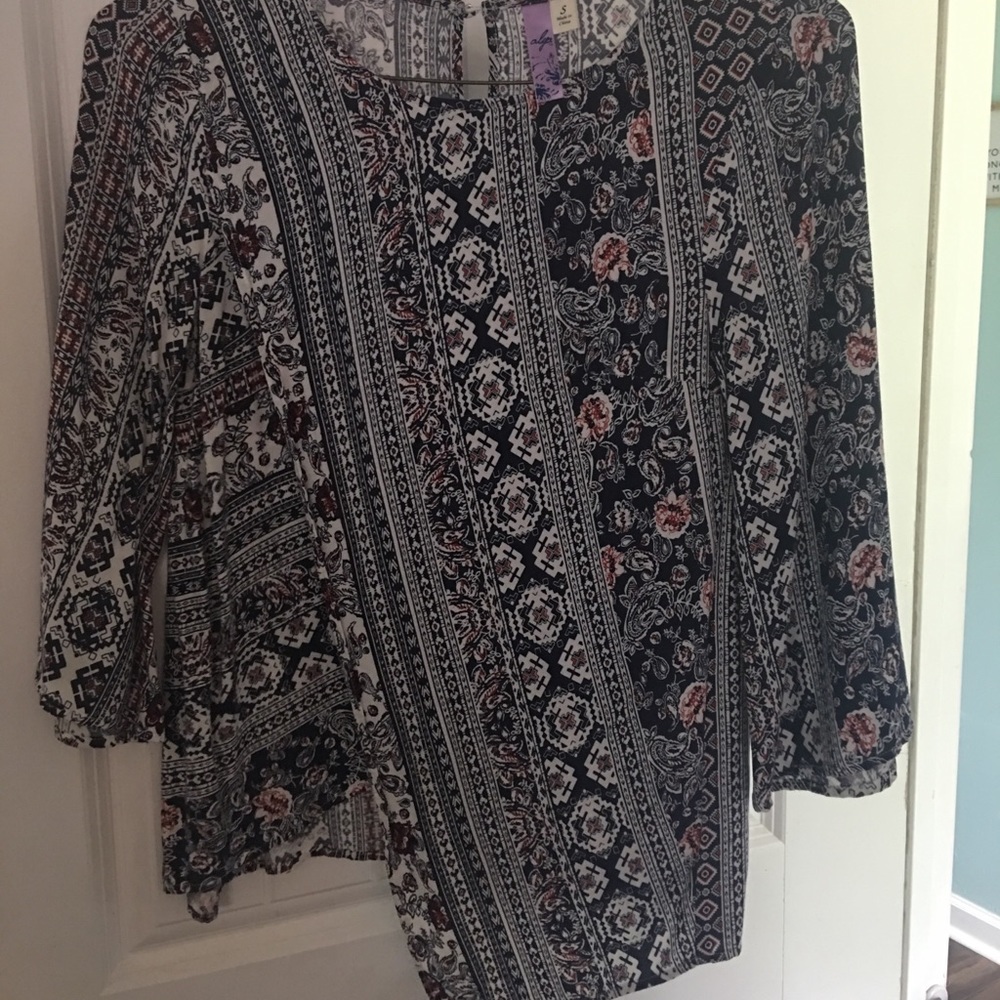 Boutique asymmetrical, wrap style blouse